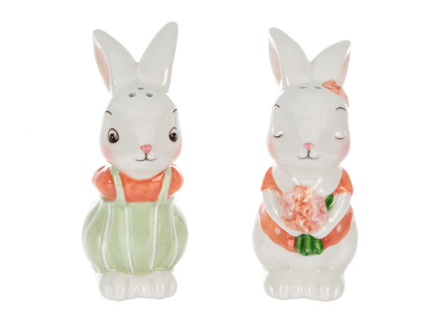 Two rabbit shaped salt and pepper shakers with orange dresses on a white background
