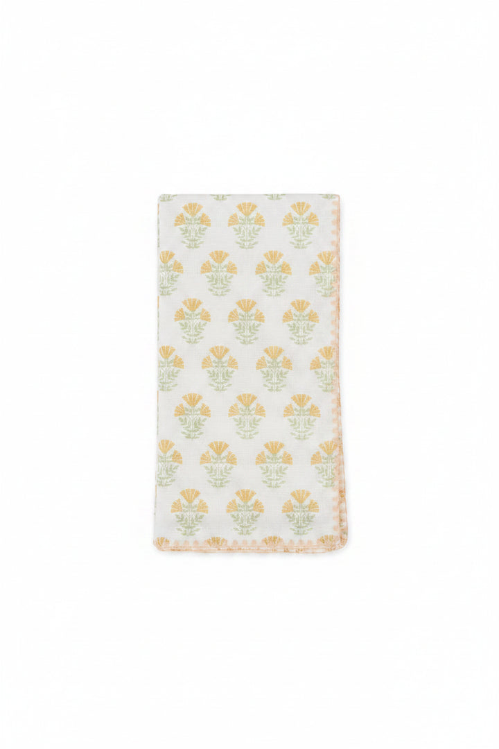 Floral patterned fabric napkin on a white background