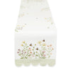 Floral and checkered table runner on a white background