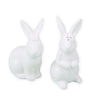 Two white rabbit-shaped salt and pepper shakers on a white background