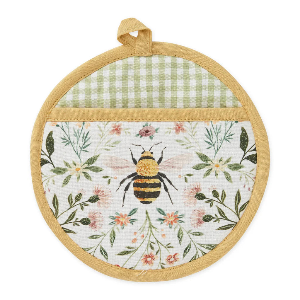 Round pot holder with bee and floral design on a white background