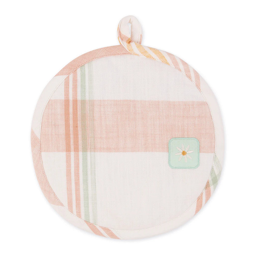 Round potholder with plaid pattern and a small square patch on a white background