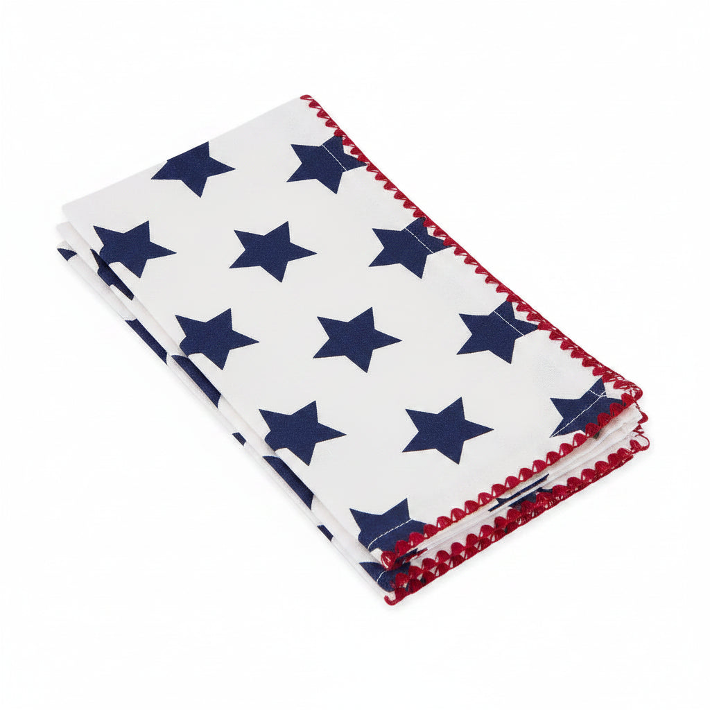 Folded fabric with blue star pattern on a white background
