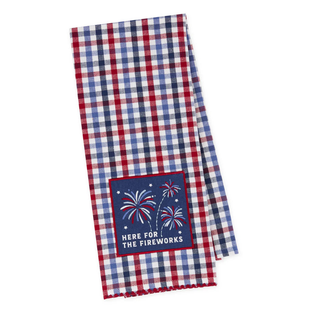 Red, white, and blue checkered towel with a firework design and text on a white background