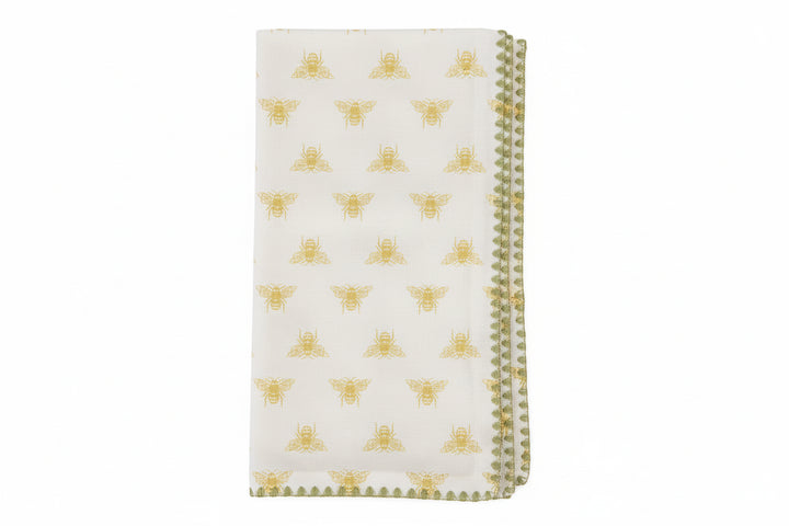 Pack of napkins with bee pattern and decorative edge on a white background
