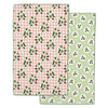 Kitchen towel with strawberry patterns on each side on a white background