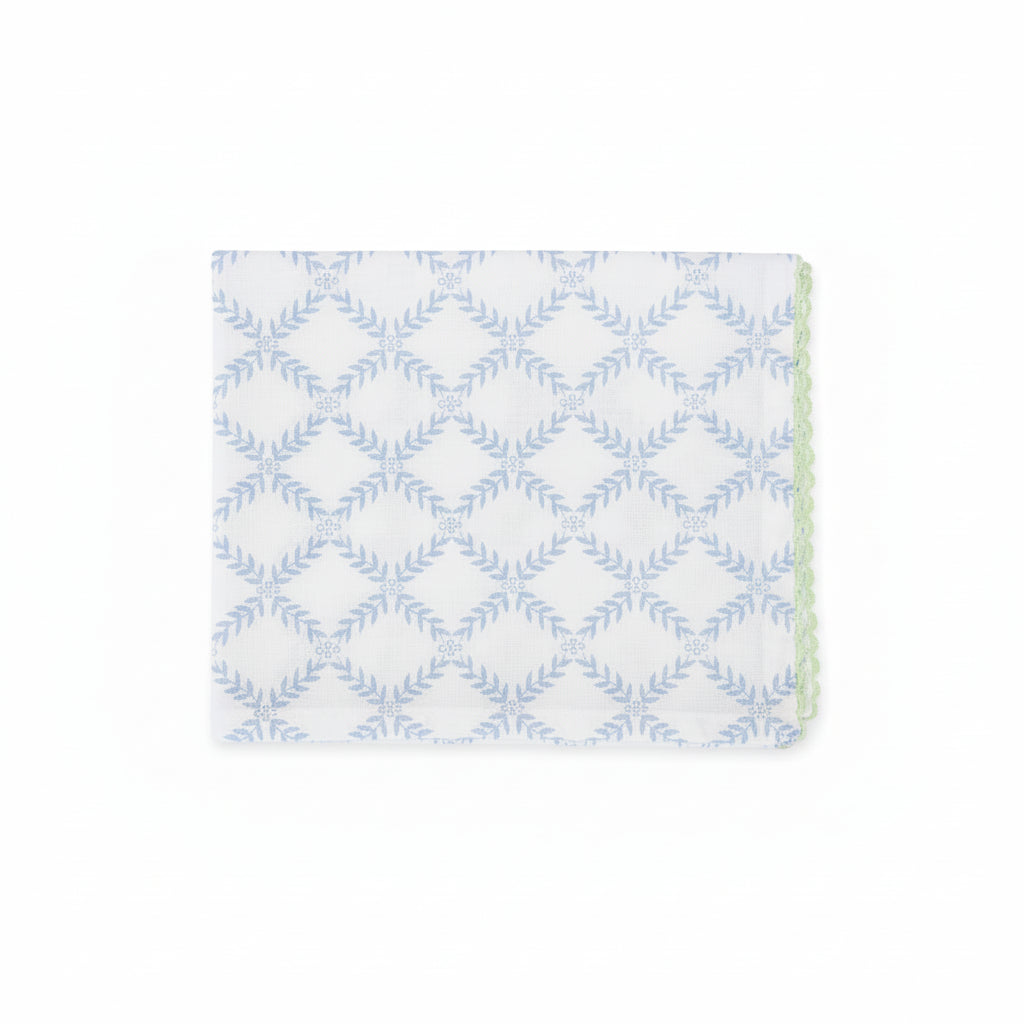 Napkin with trellis and hydrangea pattern on a white background