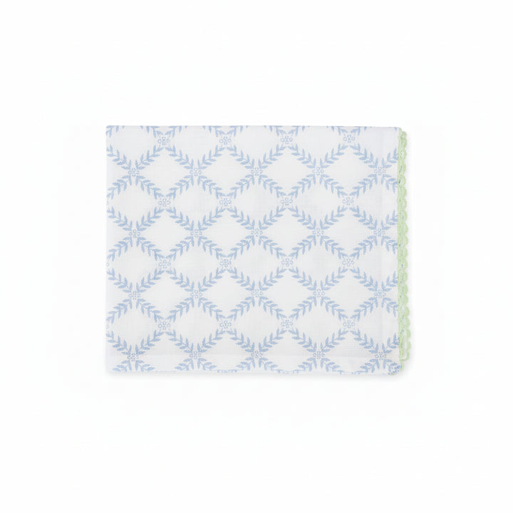 Napkin with trellis and hydrangea pattern on a white background