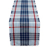 Plaid table runner with red, blue, and white pattern on a white background