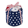 Fabric basket with star pattern containing rolled dish towels in various patriotic designs. Featured on a white background.