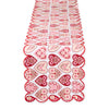 Decorative table runner with heart patterns on a white background