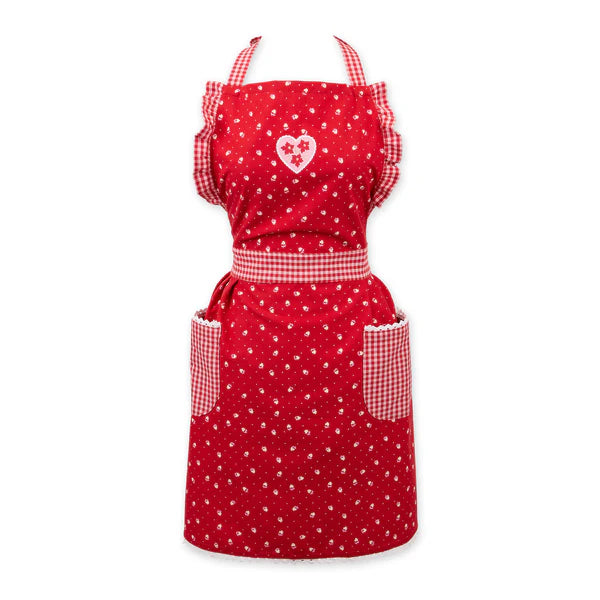 Red apron with white polka dots and a heart design on a white background