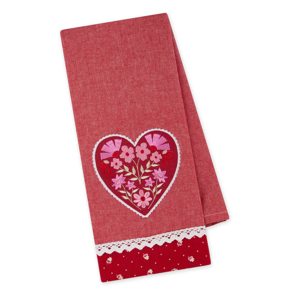 Red towel with a heart design featuring flowers on a white background