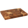 Wooden serving board with a chevron pattern on a white background
