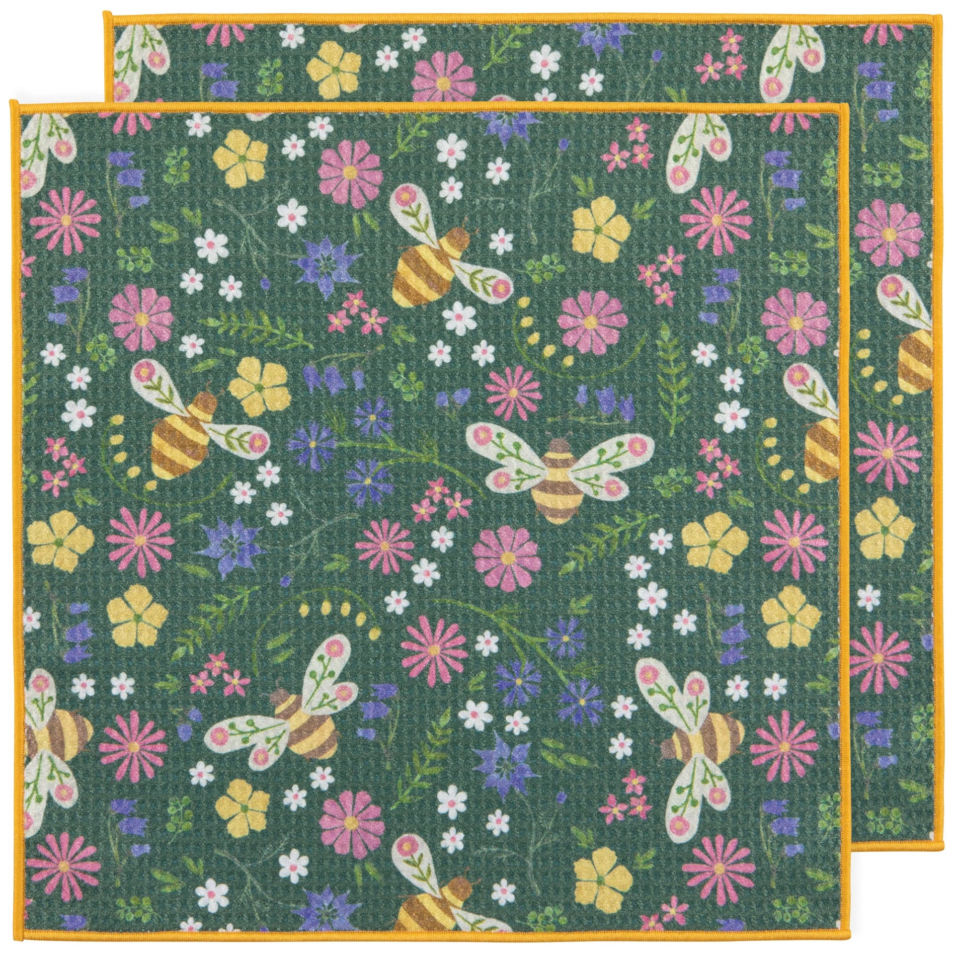 Floral and bee patterned dish cloths with colorful flowers and bees on a green background.