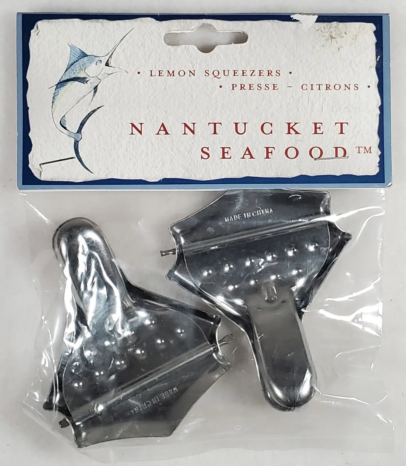 Nantucket Seafood lemon squeezers in packaging with brand label.
