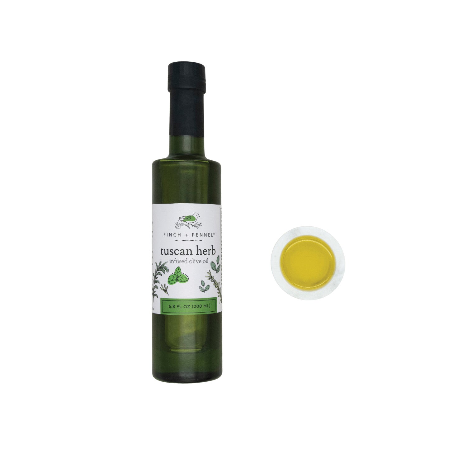 Bottle of Tuscan Herb olive oil with a droplet of oil on a white background
