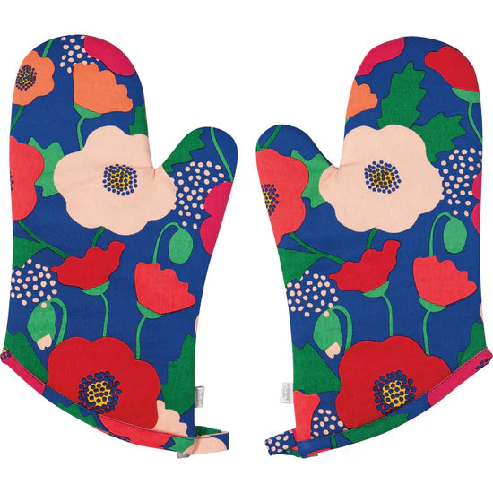Pair of floral-patterned oven mitts on a white background