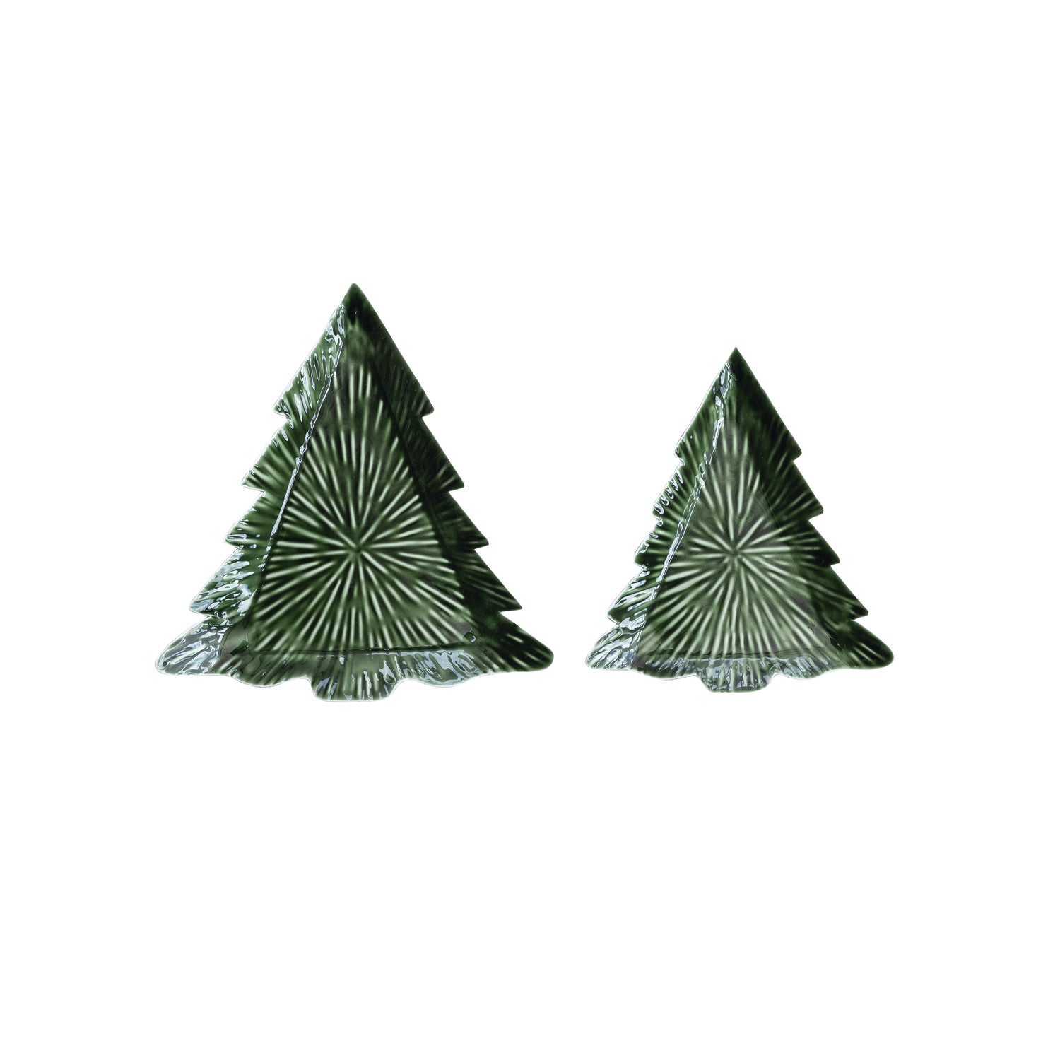 Two enameled metal tree-shaped plates on a white background