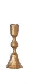 Small gold candle holder on a white background