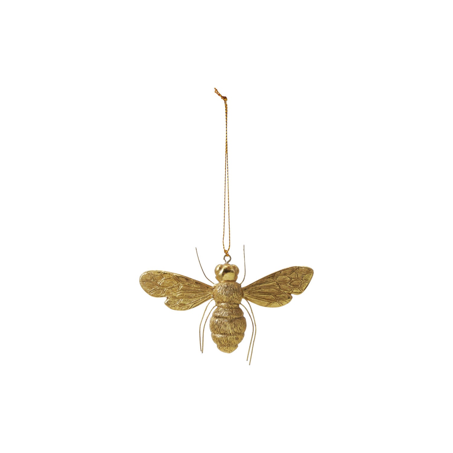 Gold bee-shaped ornament hanging on a white background