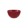 Red stoneware bowl on a white background