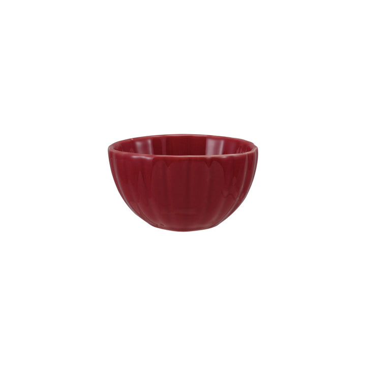 Red stoneware bowl on a white background