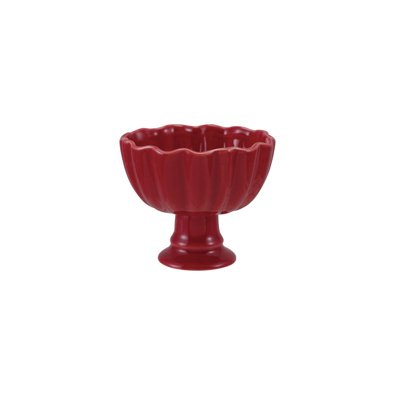 Red stoneware footed bowl on a white background