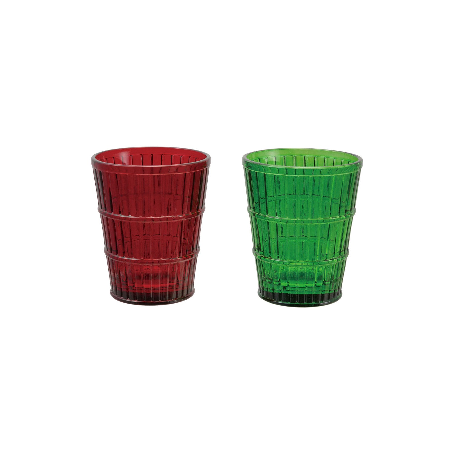 Two drinking glasses, one red and one green, on a white background