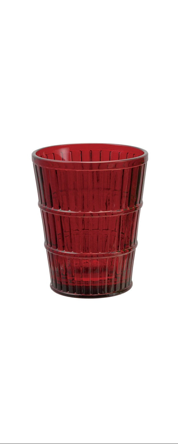 Red drinking glass on a white background