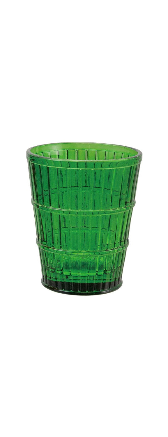 Green drinking glass on a white background