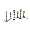 Iron candle holder with multiple candle holders on a white background