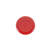 Red plate with white polka dots on a white background