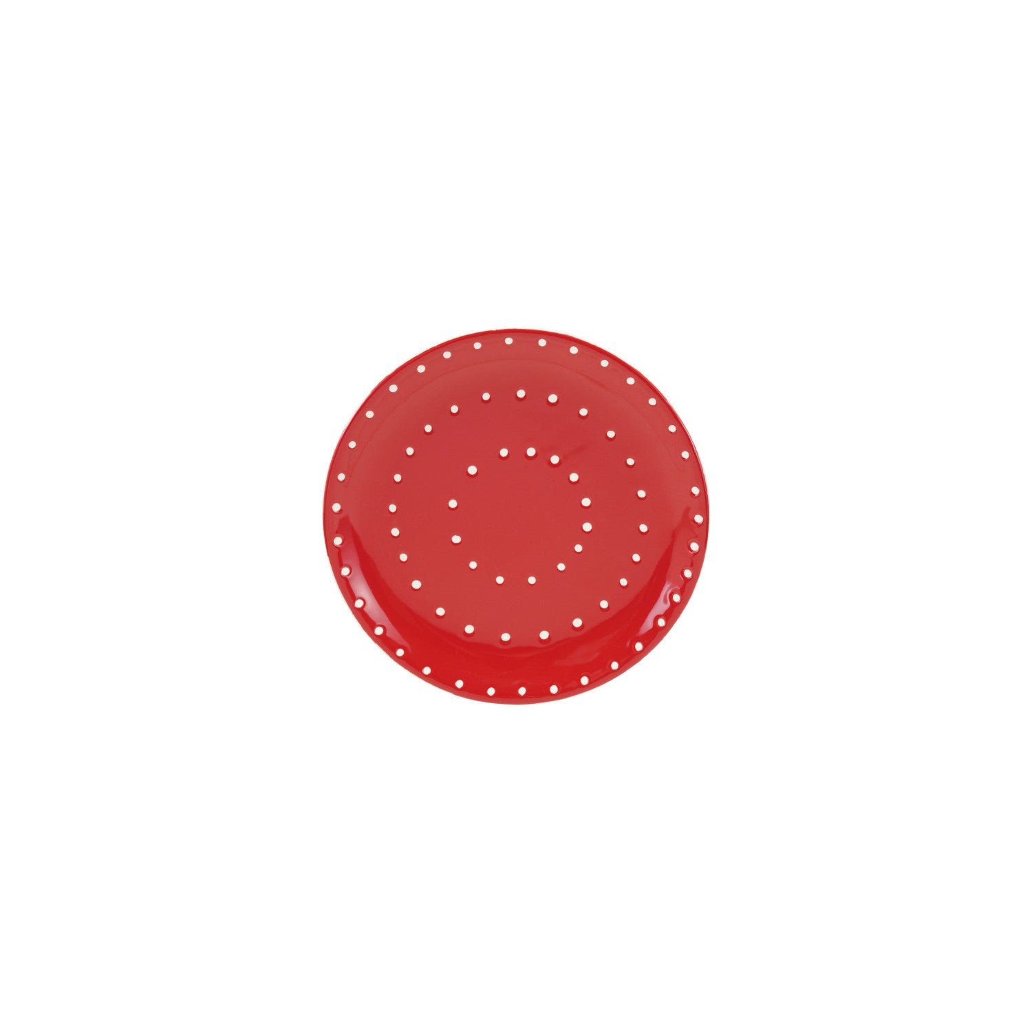 Red plate with white polka dots on a white background